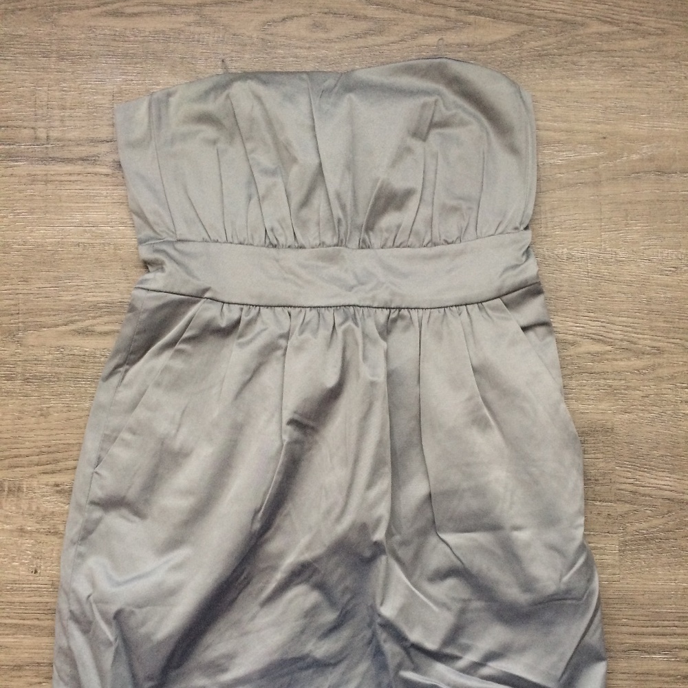 BCBGirls silver strapless dress with pockets